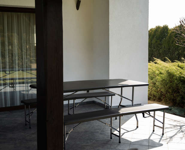 Table de jardin pliante 180 cm + 2 bancs - noir