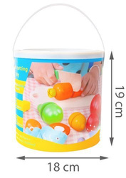 Wooden chopping vegetables in a bucket