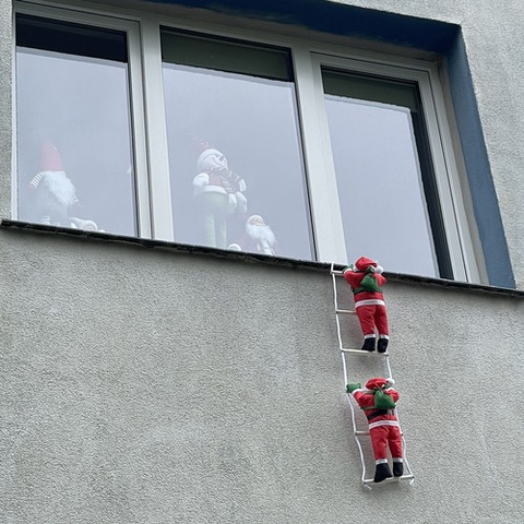 Pères Noël sur l&#39;échelle Ruhhy 22519